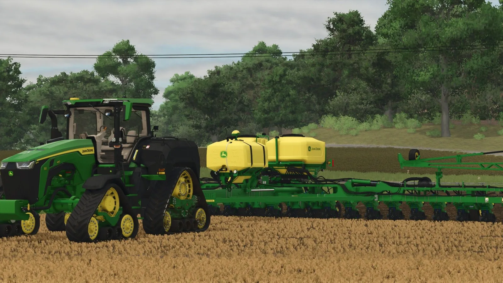 John Deere 8RX with ExactRate Tanks FS25